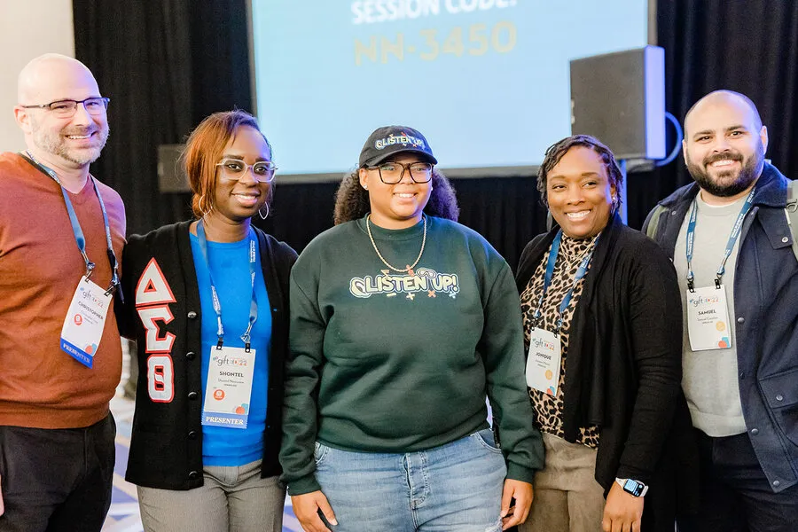 Dajae with a group of five educators after her keynote